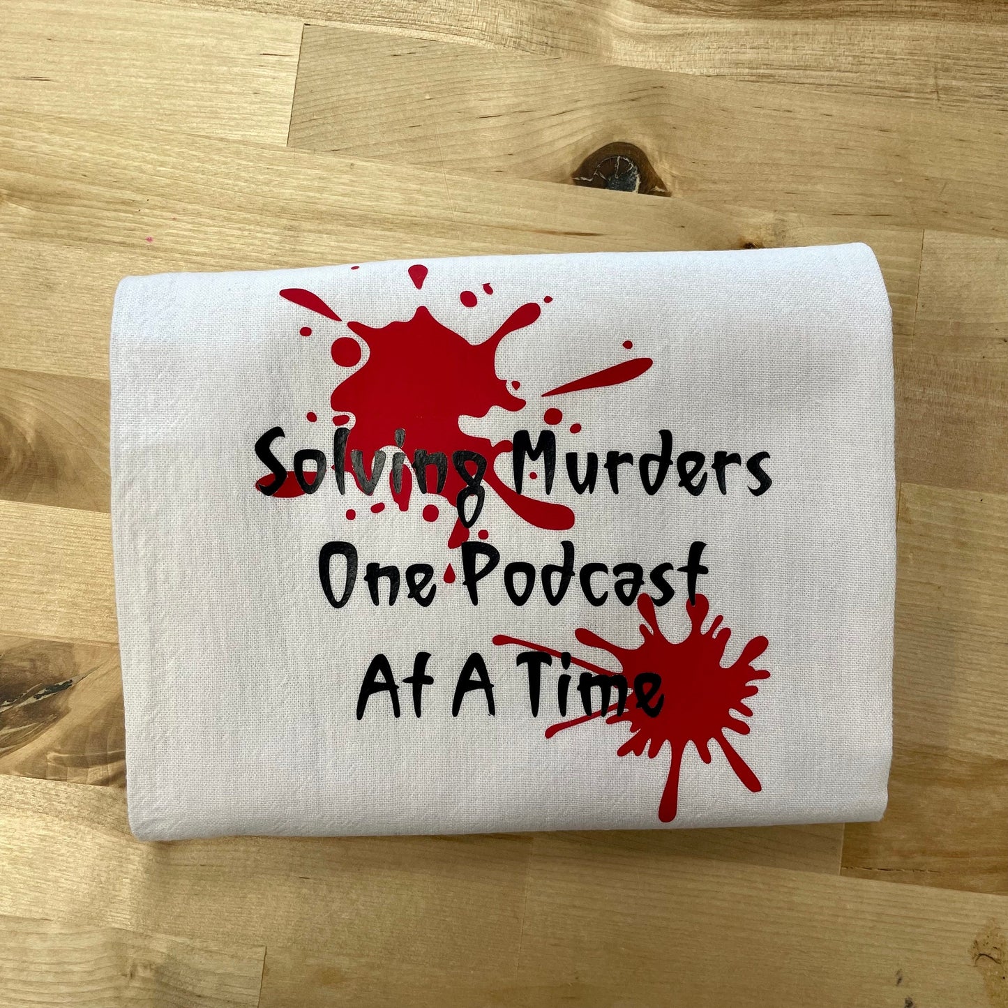 Solving murders one podcast at a time, Tea towel